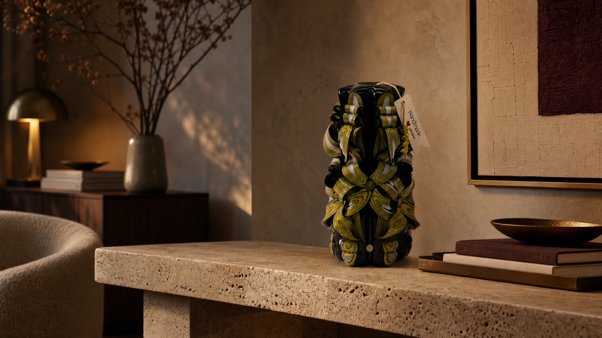 A hand-carved Luv Crafts candle styled in a refined home