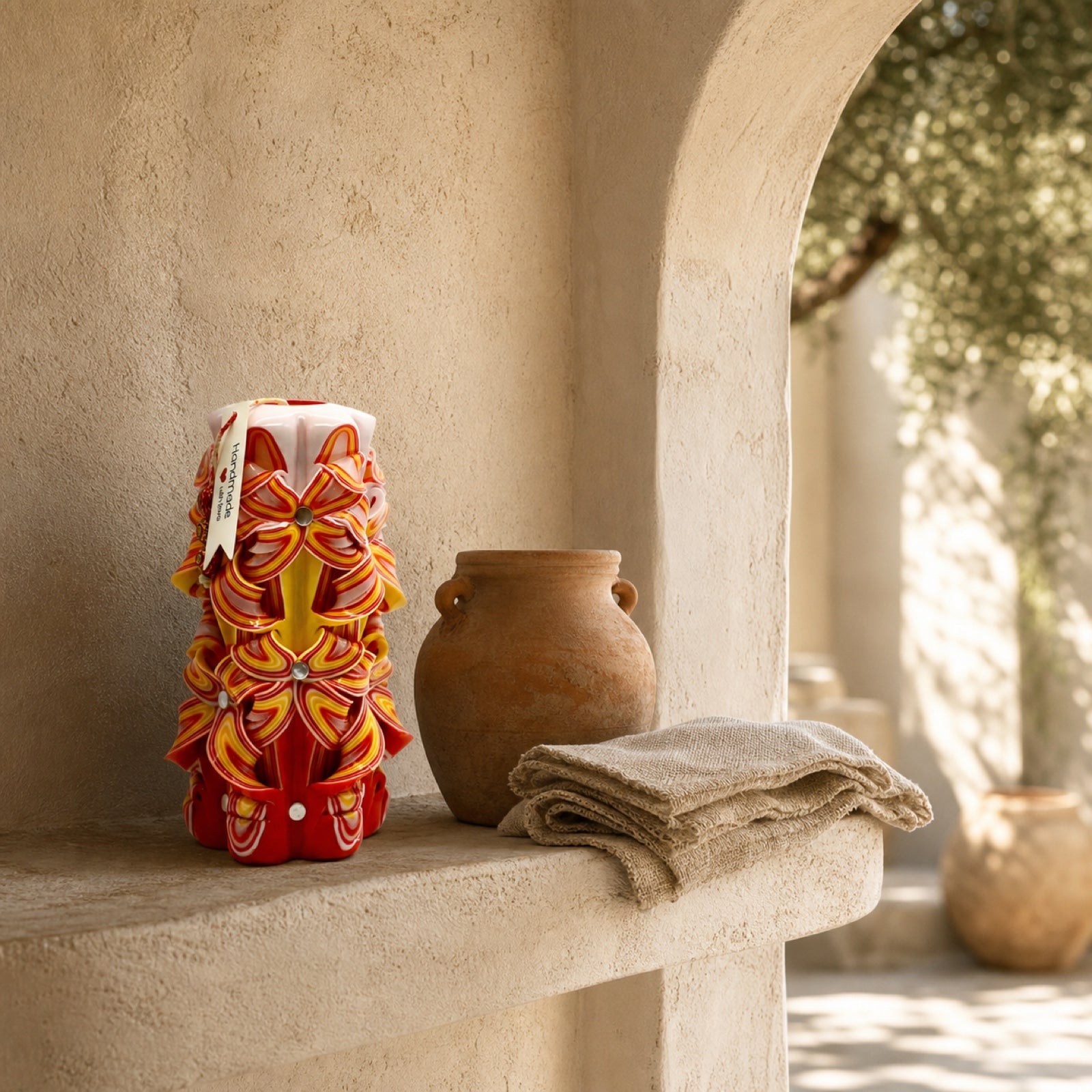 An original Scarlet Sunrise carved candle