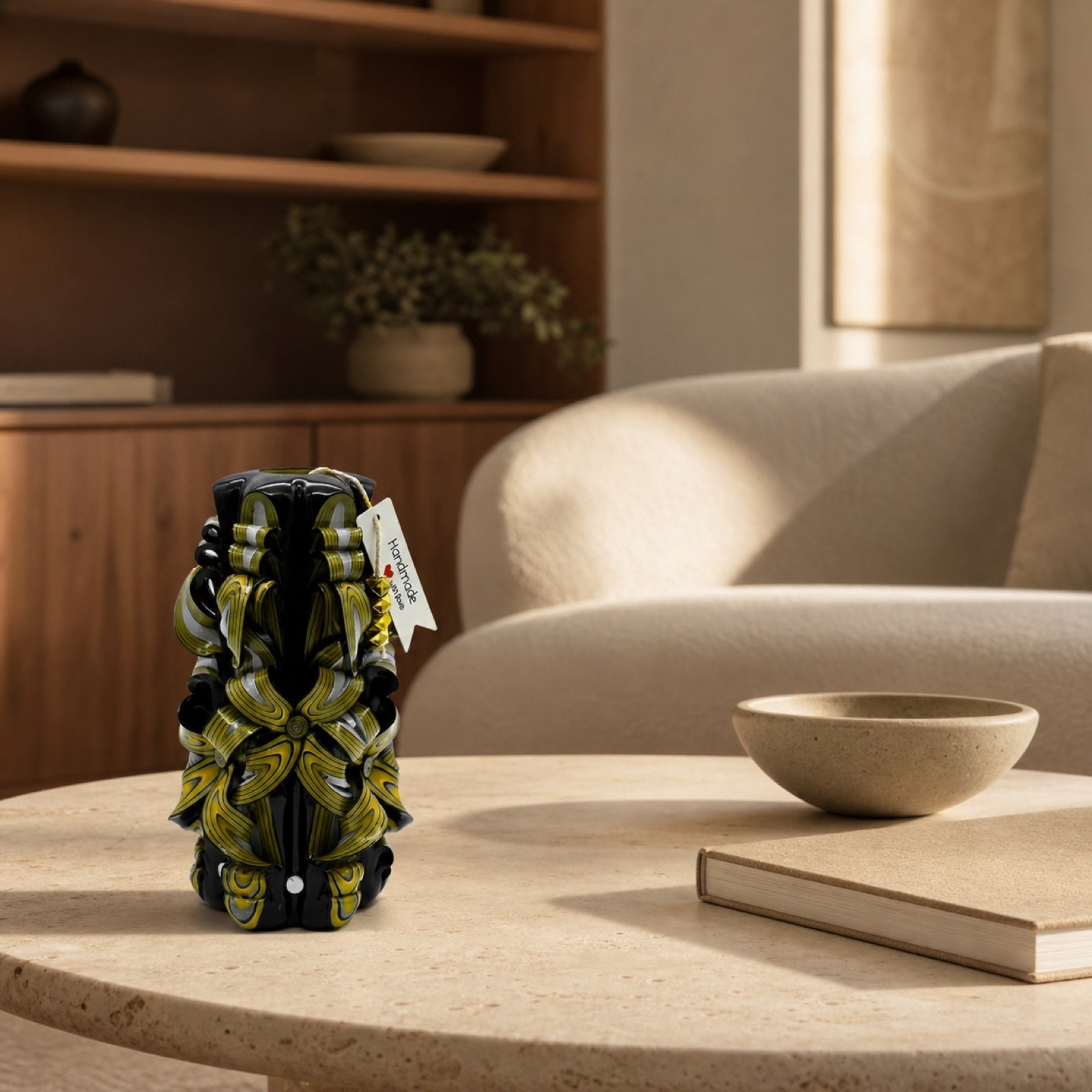 A sculptural Luv Crafts candle styled in an elegant interior