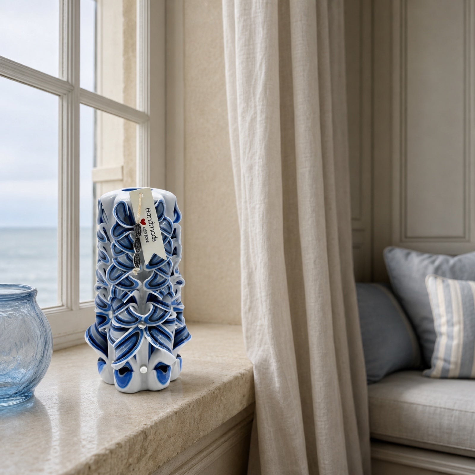 An original Arctic Blue carved candle